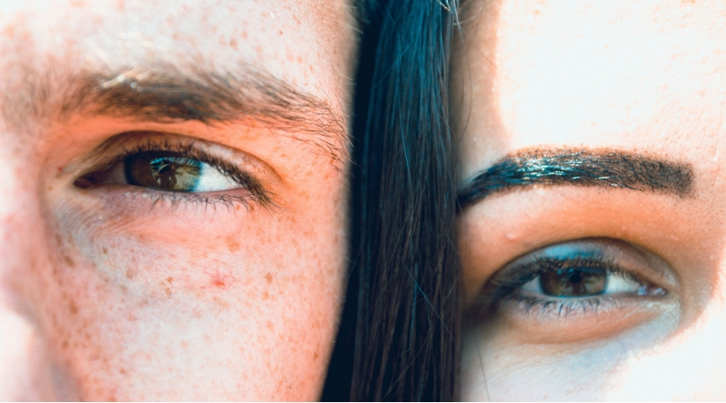 Close-up of a guy and girl's faces.